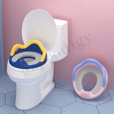 Couleur bleue ou rose vigoureuse de formation de siège de toilette de bébé de pot d'ABS